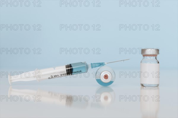 Syringe vaccine bottles table