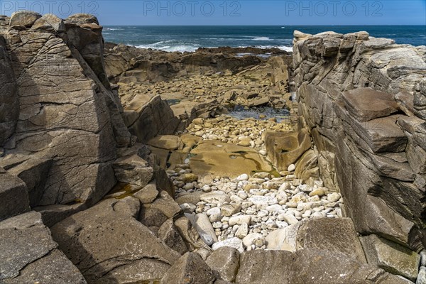 The rocks of the pink granite coast Cote de Granit Rose on the island of Ile Grande