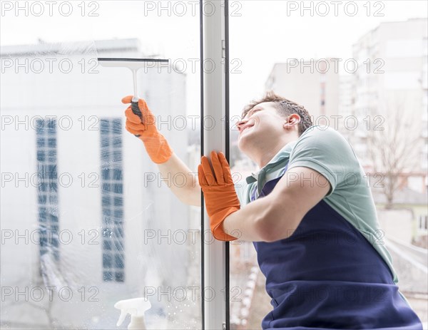 Man cleaning windows