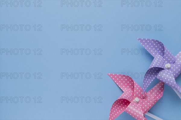 Decorative two polka dotted pinwheel blue backdrop