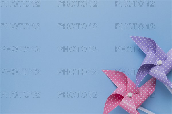 Decorative two polka dotted pinwheel blue backdrop