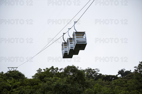 Three empty cable car rainforest costa rica