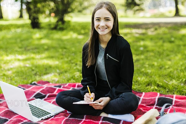 Cute girl studying park