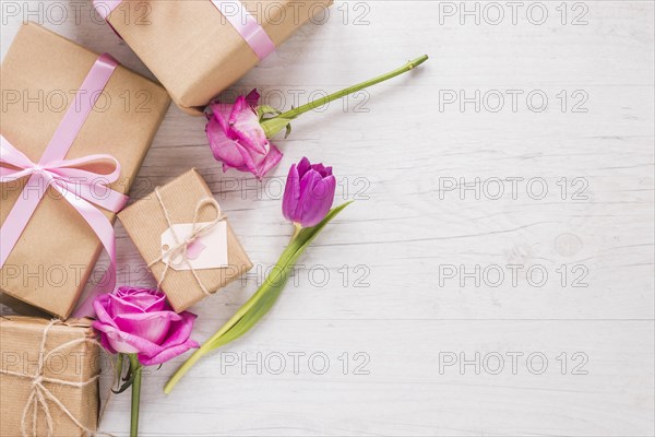 Flowers with gift boxes table