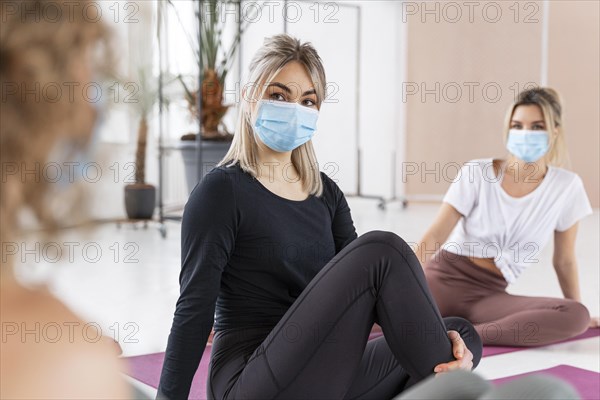 Close up women wearing masks