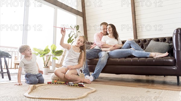 Full shot family living room