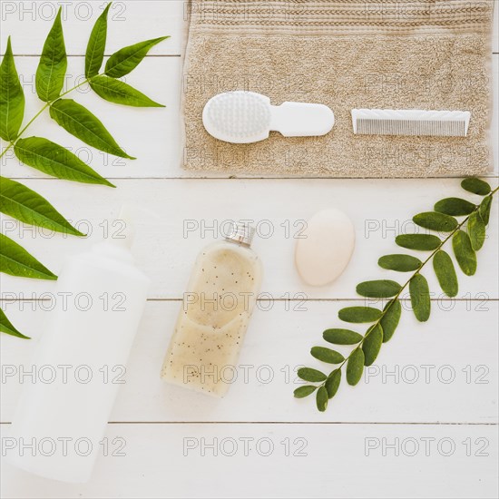 Skin health accessories table with green leaves