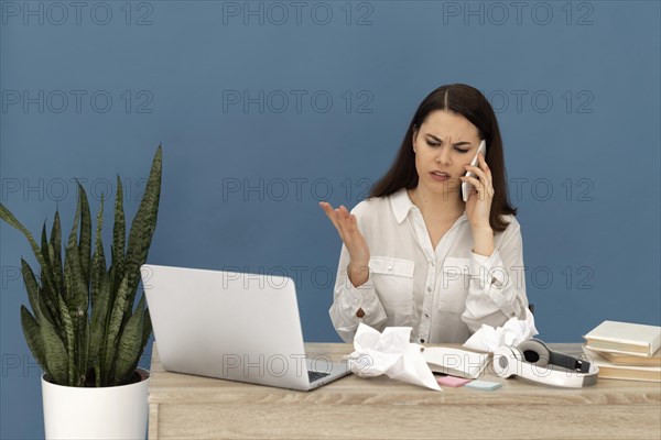 Stressed woman working laptop