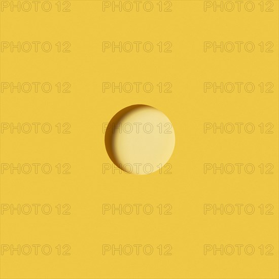 Modern background with light yellow circular piece paper