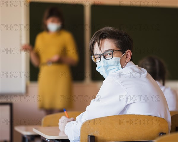 Teacher students with mask