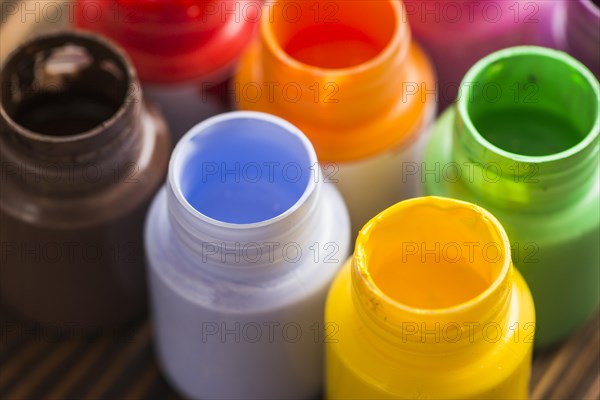 Bottles with bright paints