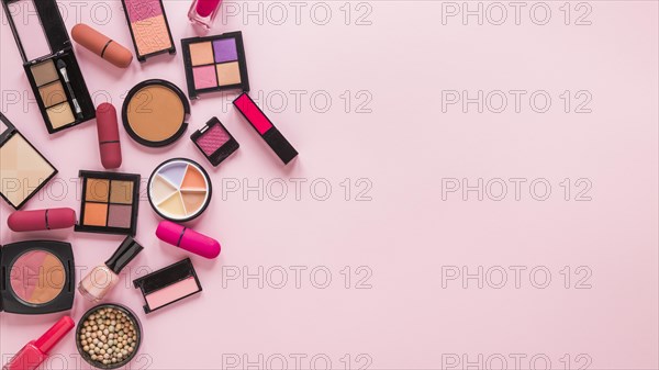 Eye shadows with lipsticks pink table