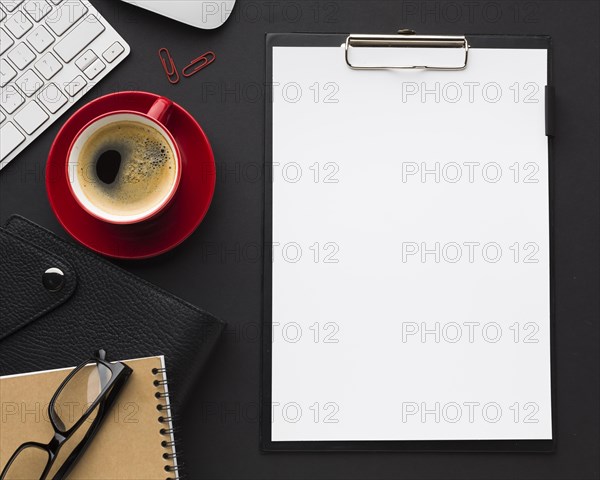 Flat lay desk with paper coffee cup