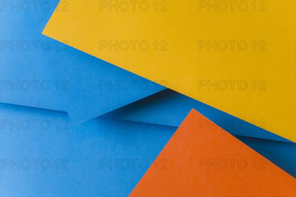 Blue orange yellow color papers background