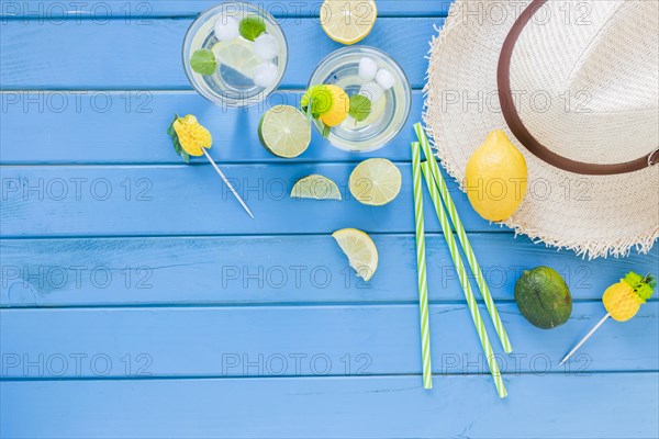 Mojito cocktails glasses with straw hat