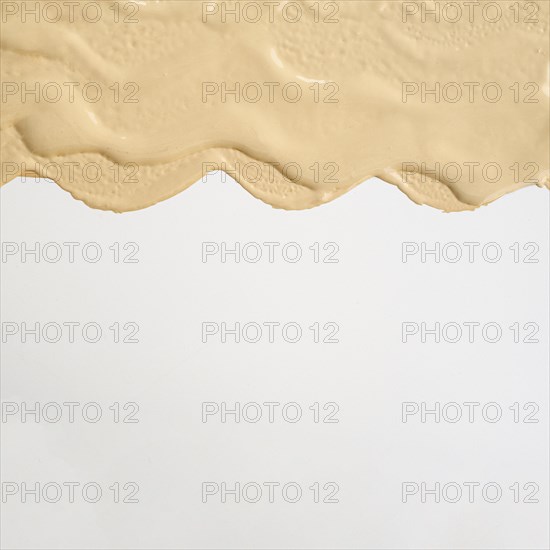 Flat lay abstract foundation stain with copy space