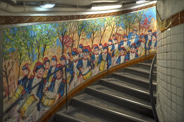 Staircase in the Metro station Abbesses decorated with a painting