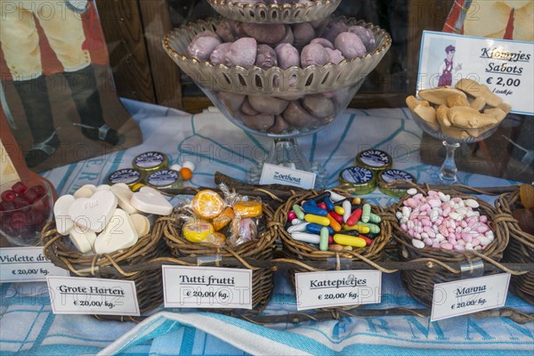 Belgian specialties and typical Ghent sweets in display window of sweet shop