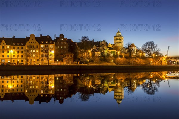 Gothic Burgtor Gate reflected in water of the Elbe Luebeck Canal