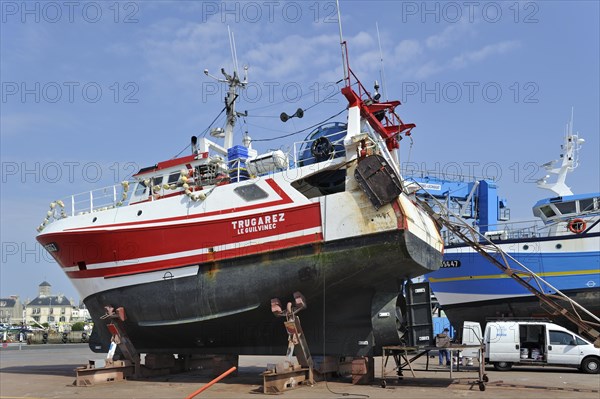 Trawler fishing boats on shipbuilding yard for maintenance works in the Guilvinec port