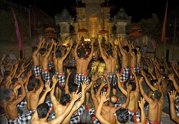 Waving hands during Kecak dance performance