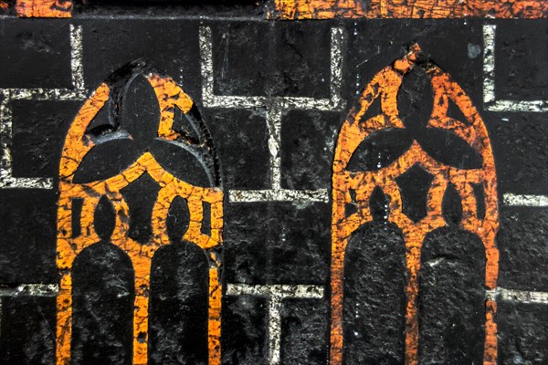 Detail of medieval epitaph on gravestone