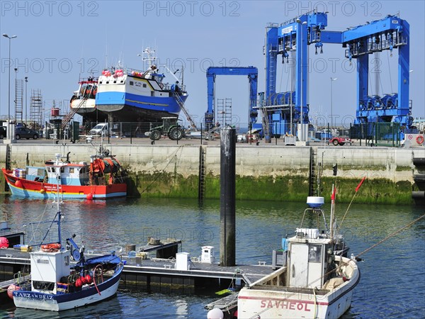 Trawler fishing boats on shipbuilding yard for maintenance works in the Guilvinec port