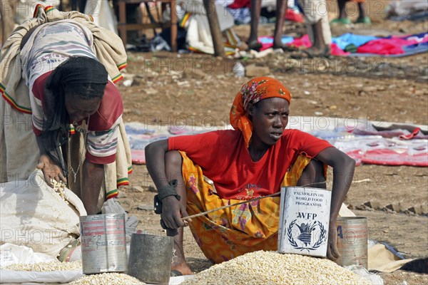 Female vendors selling food on market in Konso