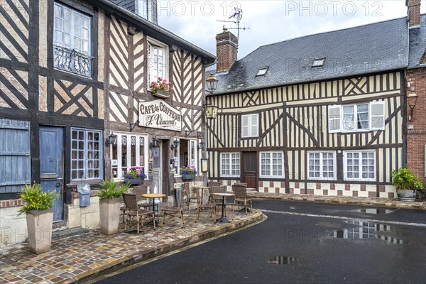 Half-timbered houses and cafe in one of the most beautiful villages in France Beuvron-en-Auge