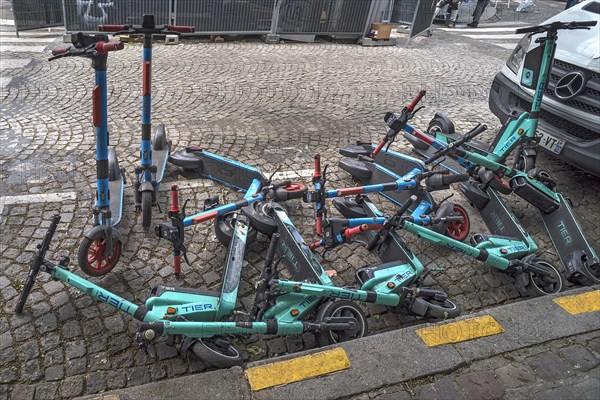 E-scooters thrown on the pile on the street