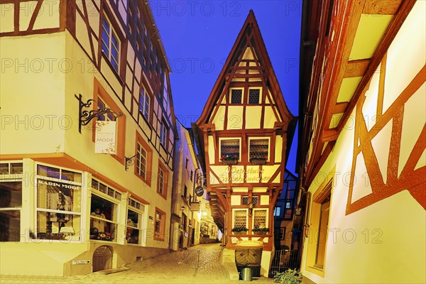 Pointe house on the medieval market square in the evening