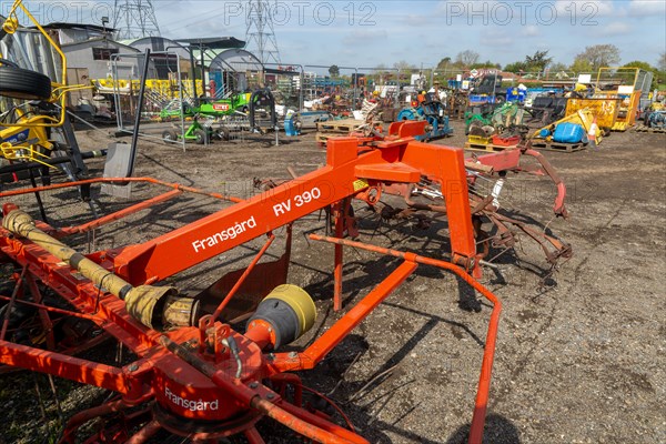 Secondhand agricultural equipment and machinery in yard for auction