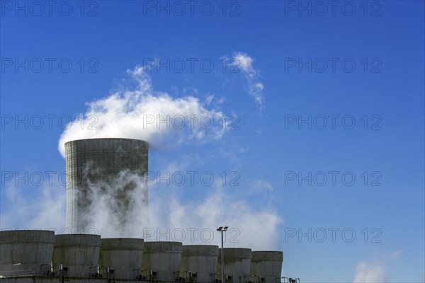 Industrial estate showing cooling tower and chimneys at the BASF chemical production site in the port of Antwerp