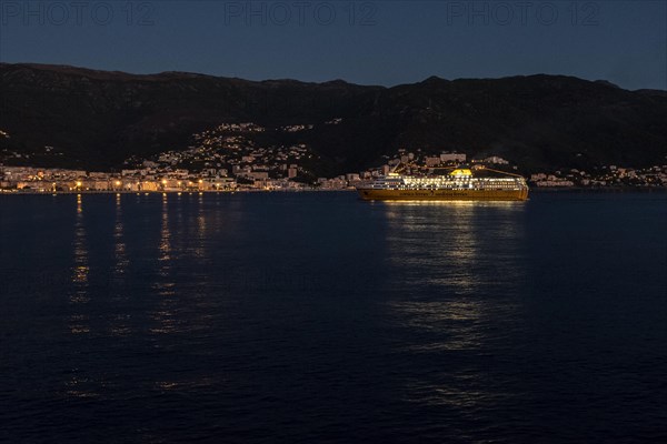 Ferry leaves Bastia in the morning haze. The port city in the north-east of the Mediterranean island of Corsica is one of the most frequently visited destinations between mainland France and Corsica