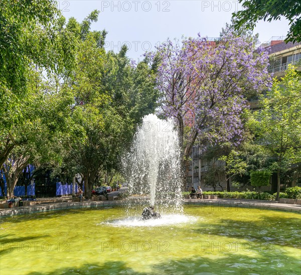 Water fountain on road roundabout