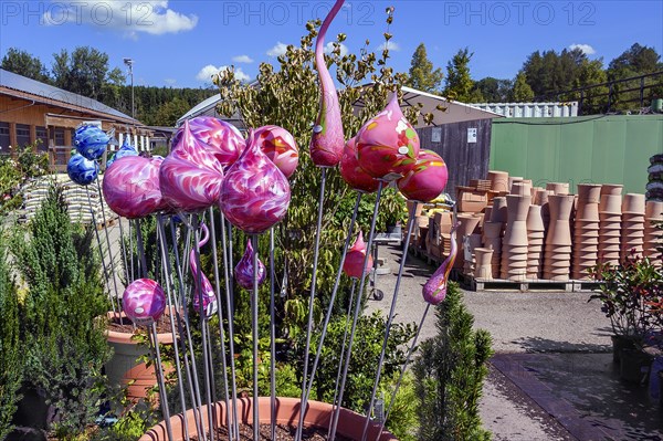 Art by glassblowers in a garden centre