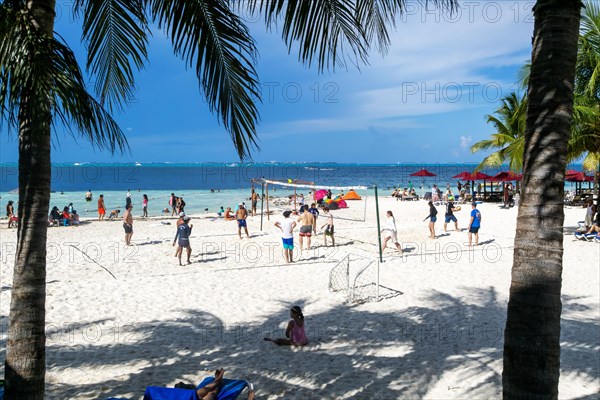 Volley ball on sandy beach in front of Hotel Casa Maya