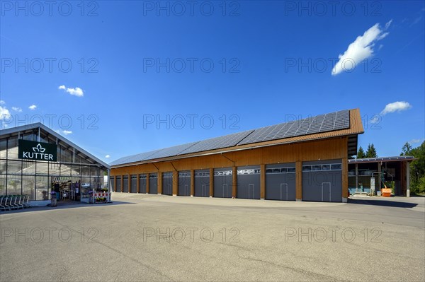 Garden centre and large warehouses with solar modules