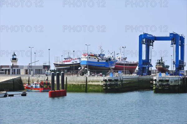 Trawler fishing boats on shipbuilding yard for maintenance works in the Guilvinec port