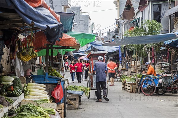 Chinese food market stalls selling vegetables in Glodok