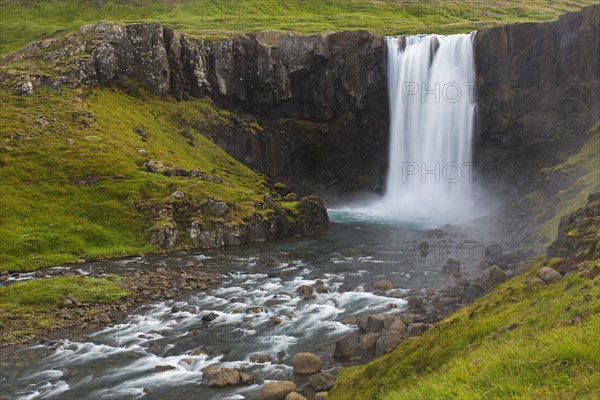 Gufufoss waterfall in summer on the Fjaroara river flowing in the Seyoisfjoerour