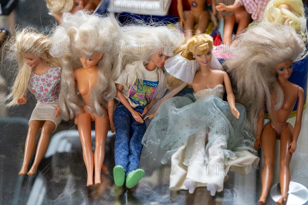 Barbie or Sindy dolls on display in auction room