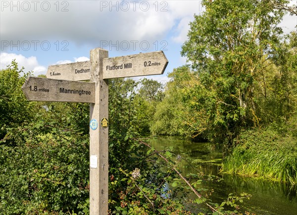 Wooden distance direction signpost