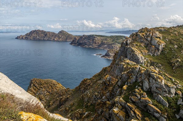 West facing steep cliffs view north from Isla del Faro