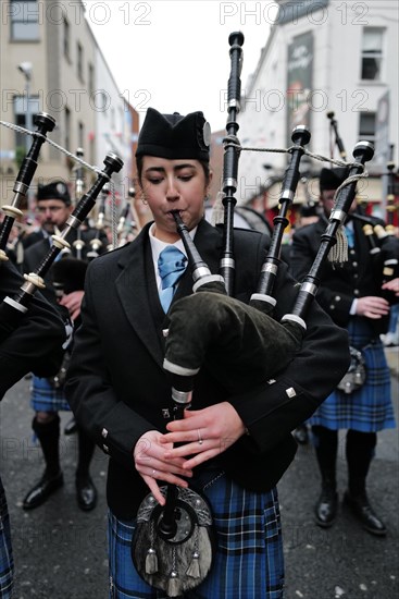 An Irish piper plays a tune in Temple Bar at the start of Trad Fest