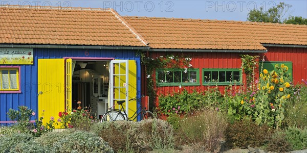 Colourful cabins of oyster farmers renewed and converted into arts and crafts shops at the harbour of Le Chateau-d'Oleron on the island Ile d'Oleron