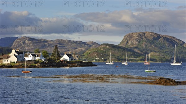 Sailing boats on Loch Carron moored at Plockton harbour