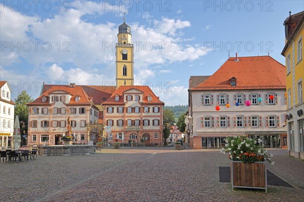 Twin houses and tower of St. John's Minster Church