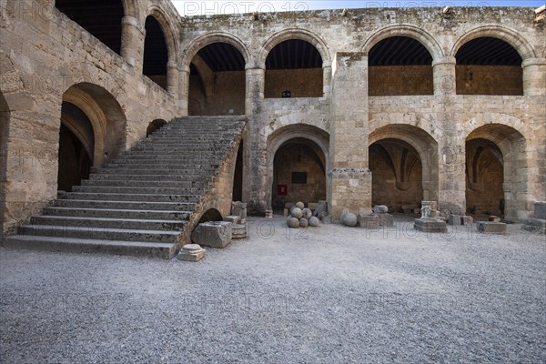 Two-storey building with a large courtyard and surrounding arcade