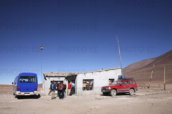 Vehicles at official border post between Chile and Bolivia
